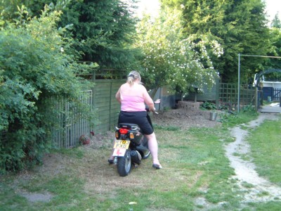 Kim on Bens Scooter